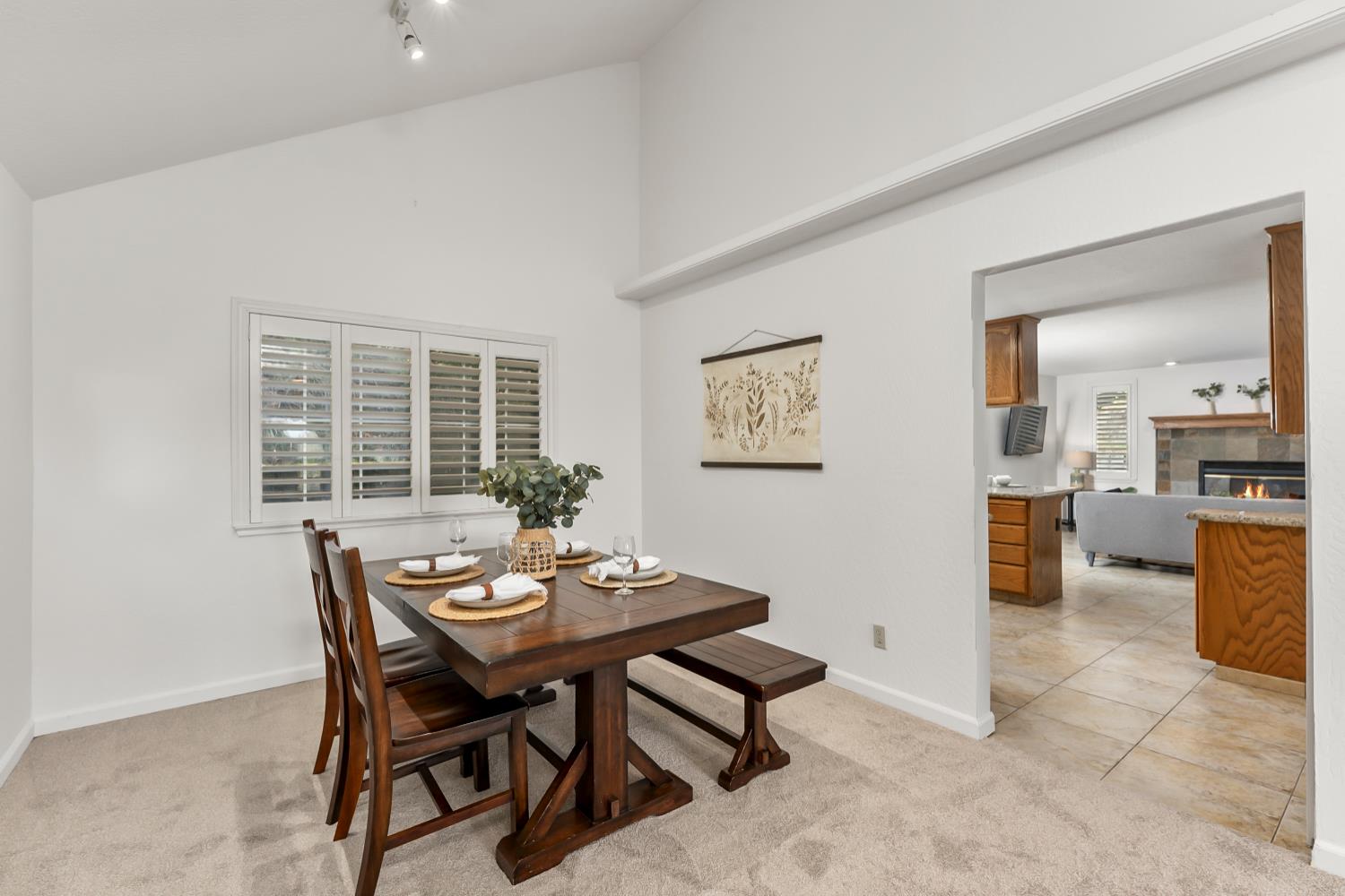 2960 Pasada Road Cameron Park, CA 95682 - Photo 7 of 40 a view of a dining room with furniture and a window