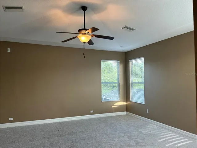 a view of balcony with wooden floor
