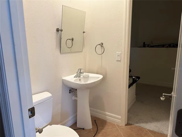 a view of a porch and garden