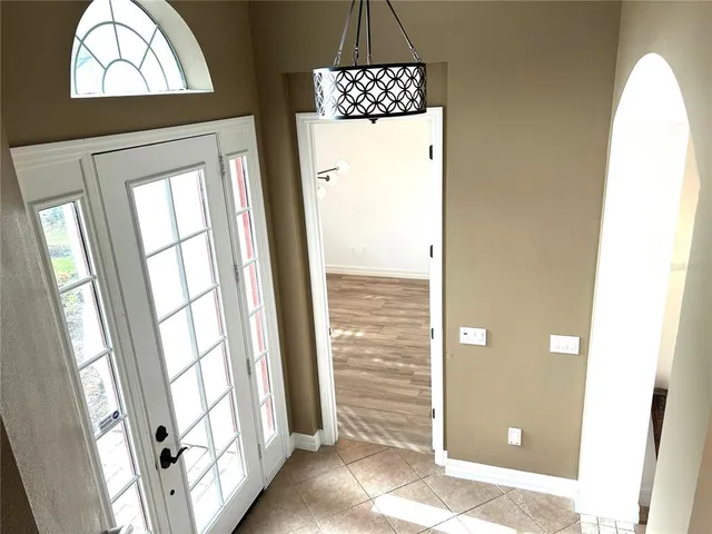 a view of front door and yard