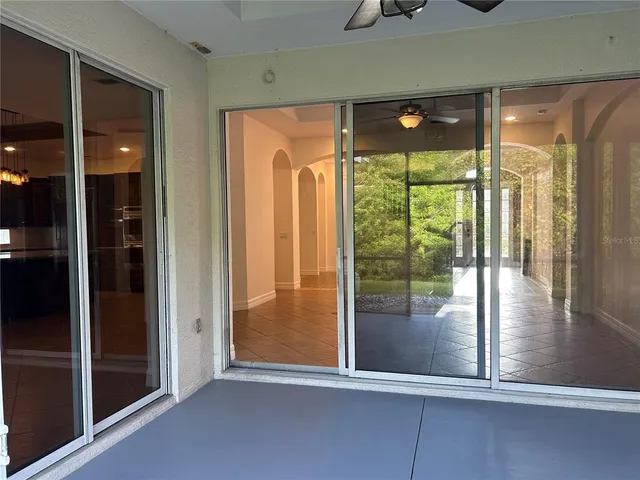 a view of a swimming pool with a patio