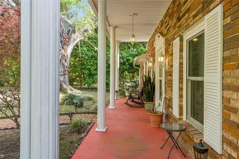 a view of a backyard of the house