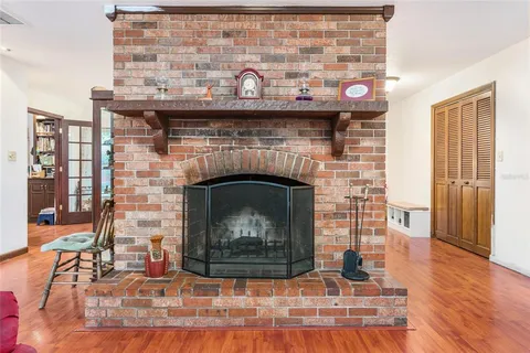 a fireplace with a vase on top of it