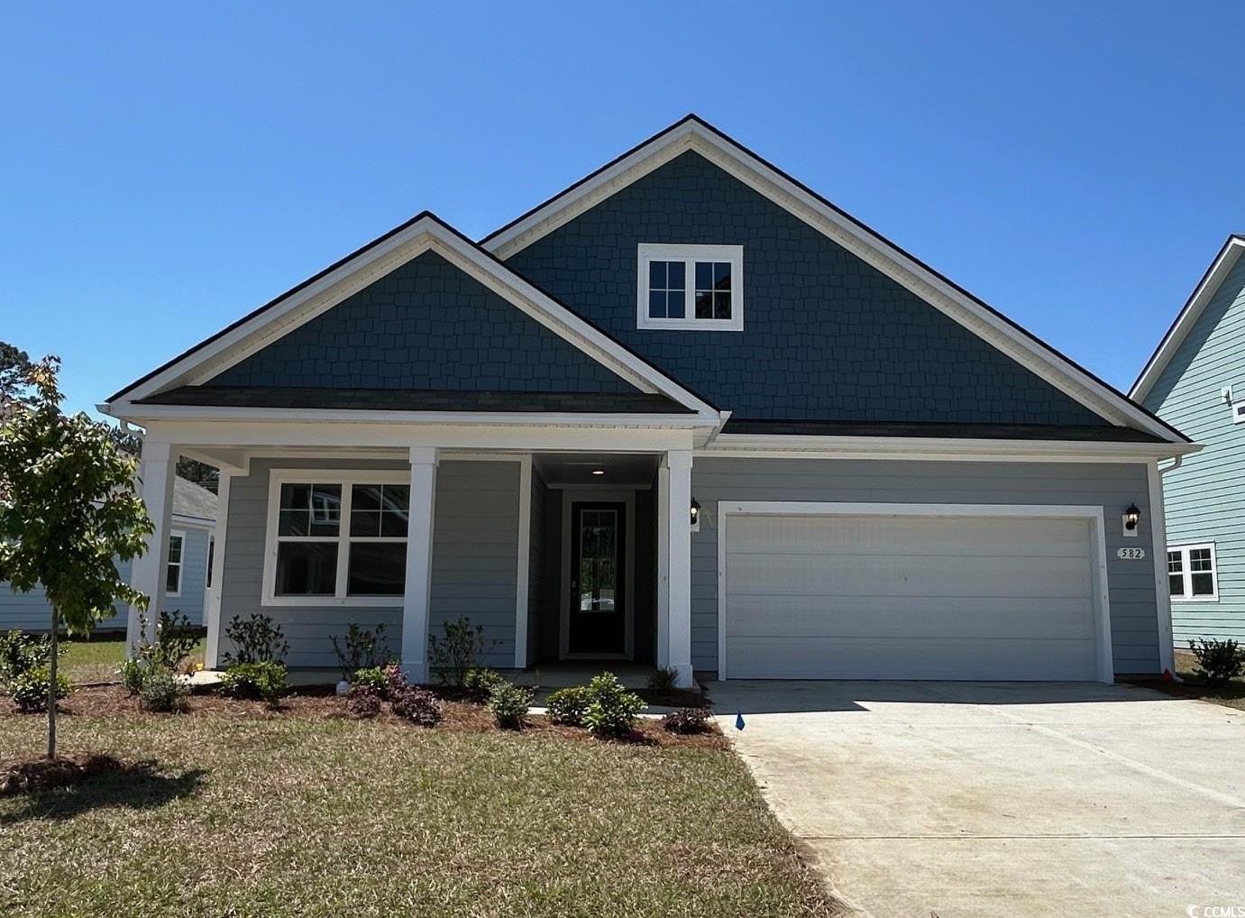 582 Haven View Way Murrells Inlet, SC 29576 - Photo 1 of 17 Craftsman-style home featuring a garage, driveway,