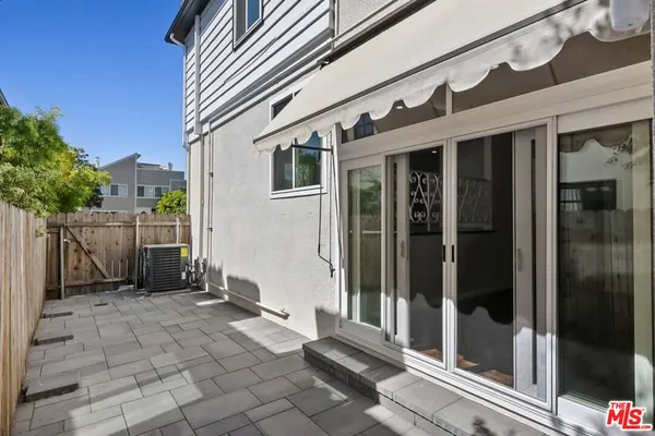 a view of a house with a glass door