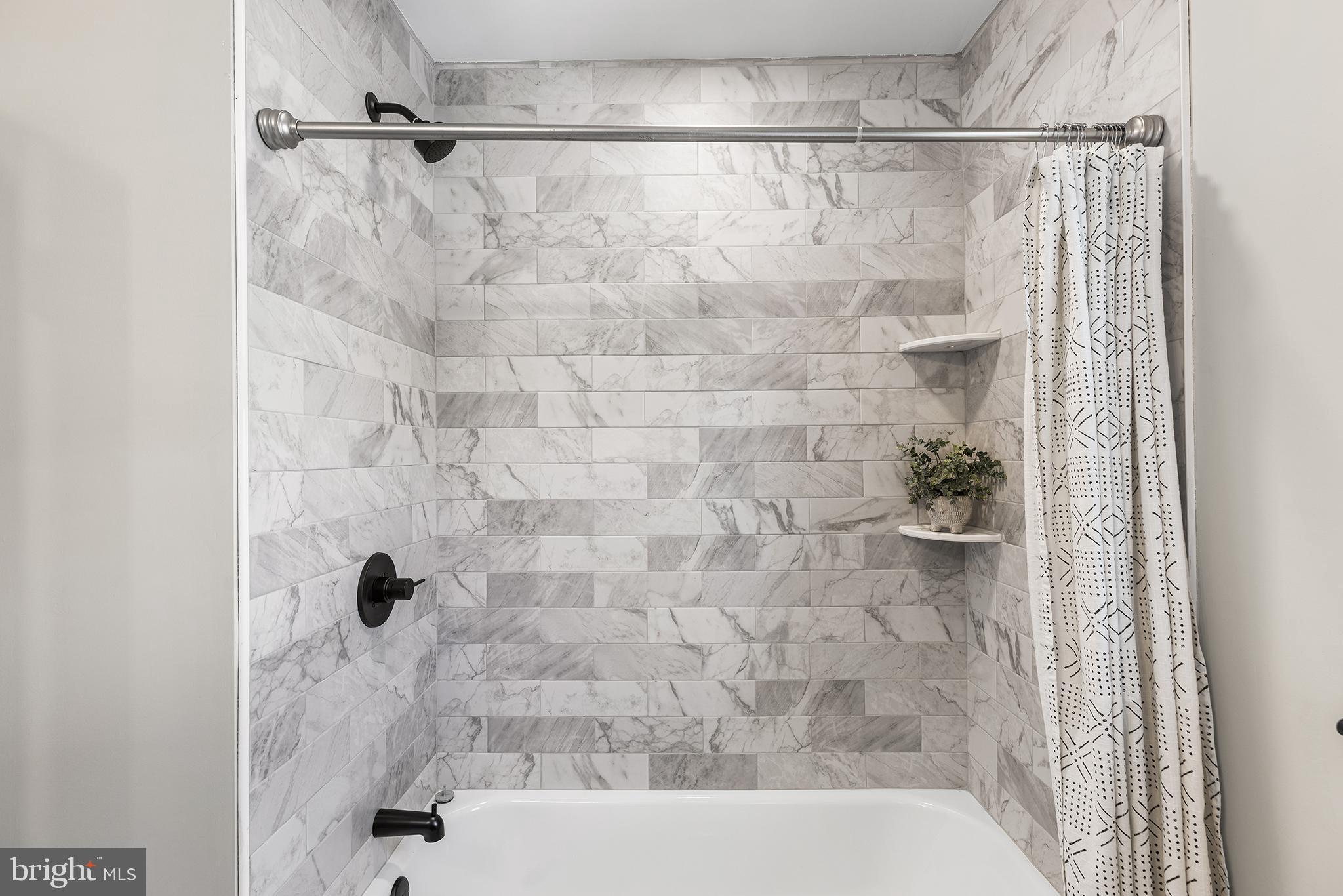 26 Virginia Circle Ridley Park, PA 19078 - Photo 22 of 49 a bathroom with a shower and a shower