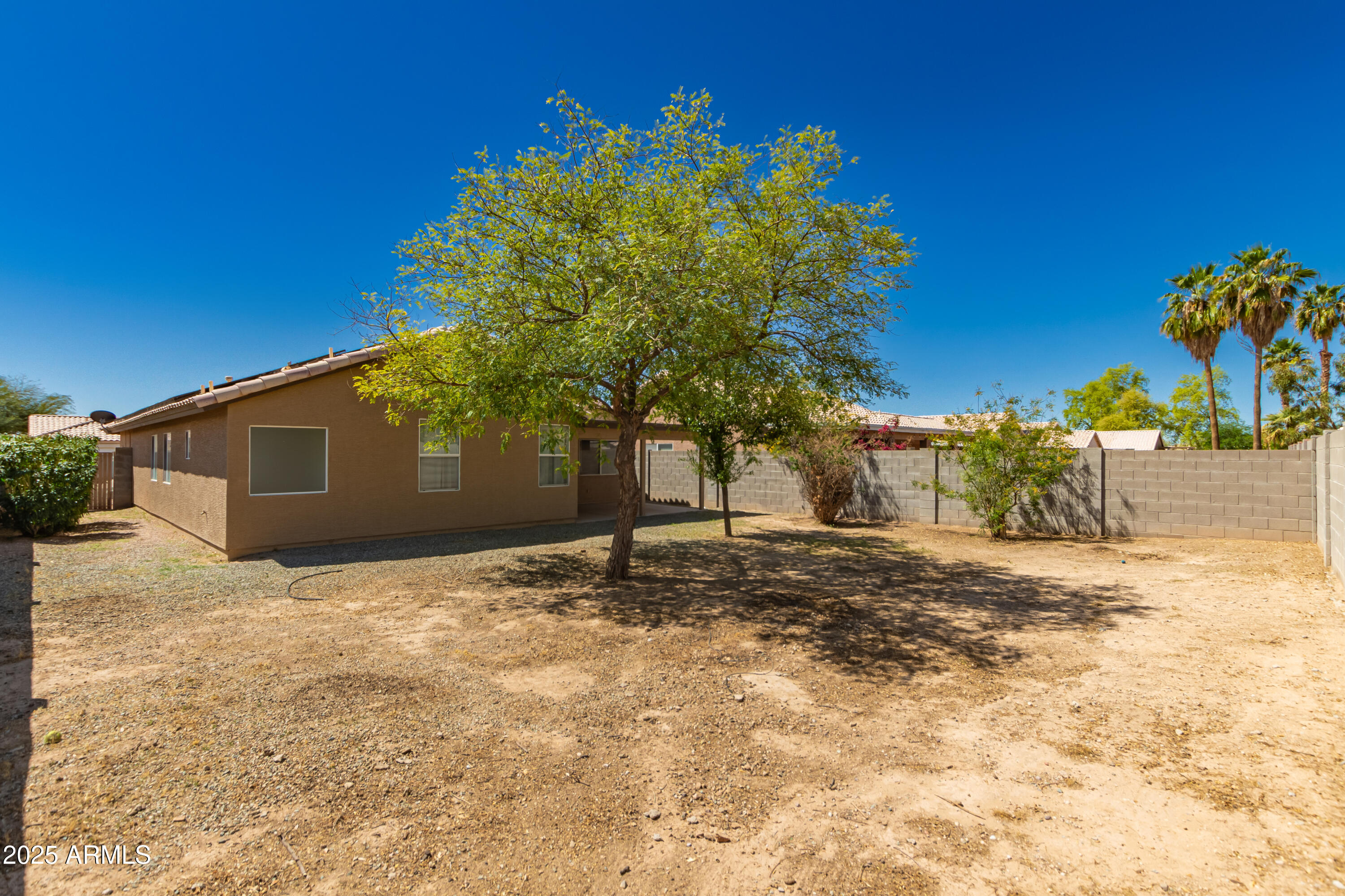 16112 West Buchanan Street Goodyear, AZ 85338 - Photo 16 of 17 BACKYARD SIDE