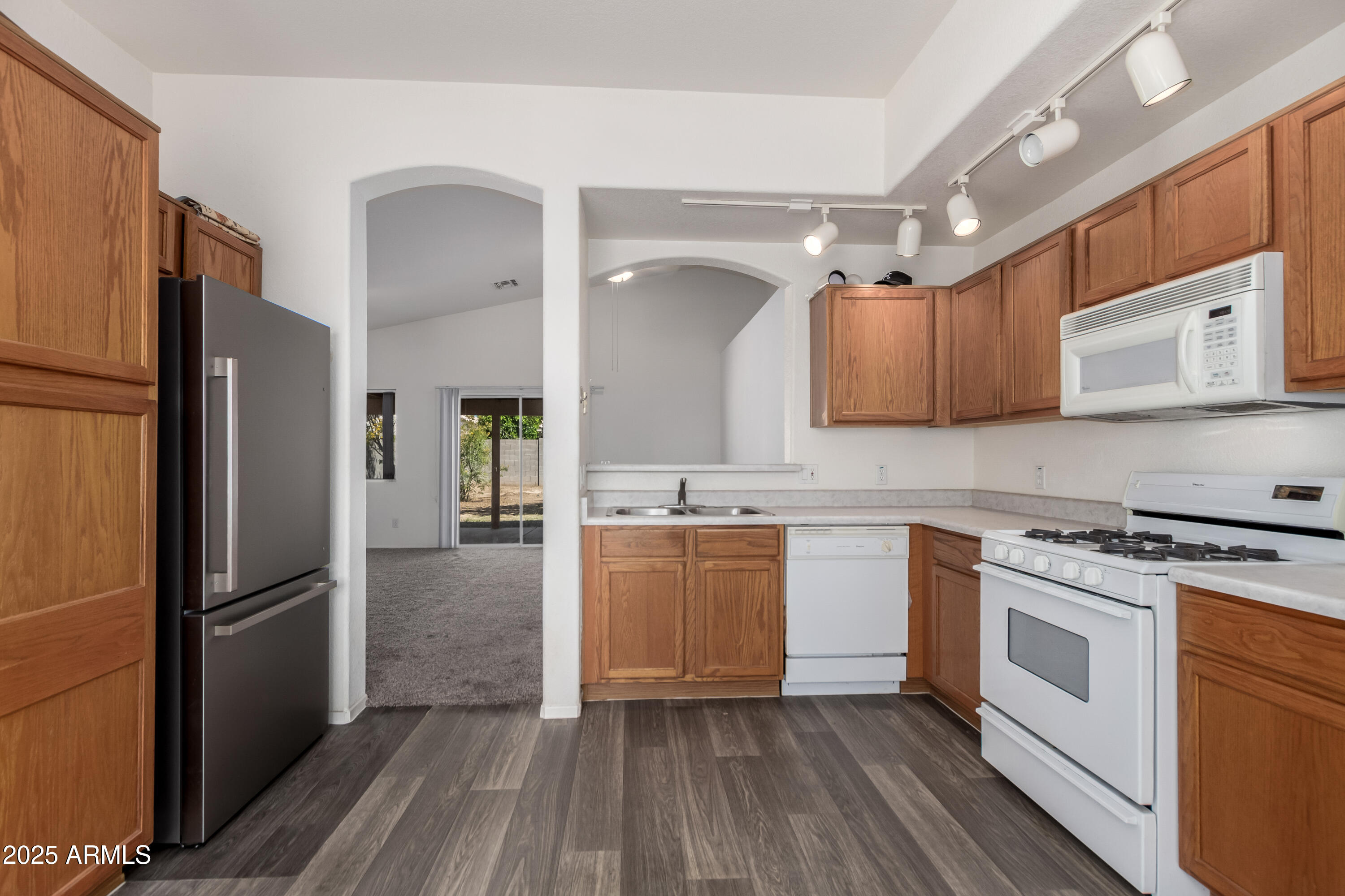16112 West Buchanan Street Goodyear, AZ 85338 - Photo 7 of 17 KITCHEN FRONT