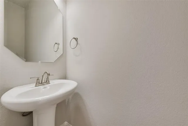 a sink with a mirror