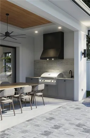 a kitchen with a table chairs and a sink