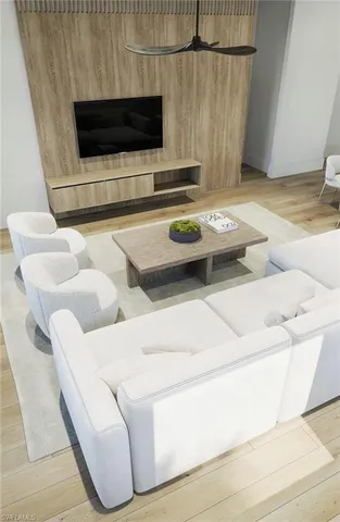 a living room with a couch and a flat screen tv