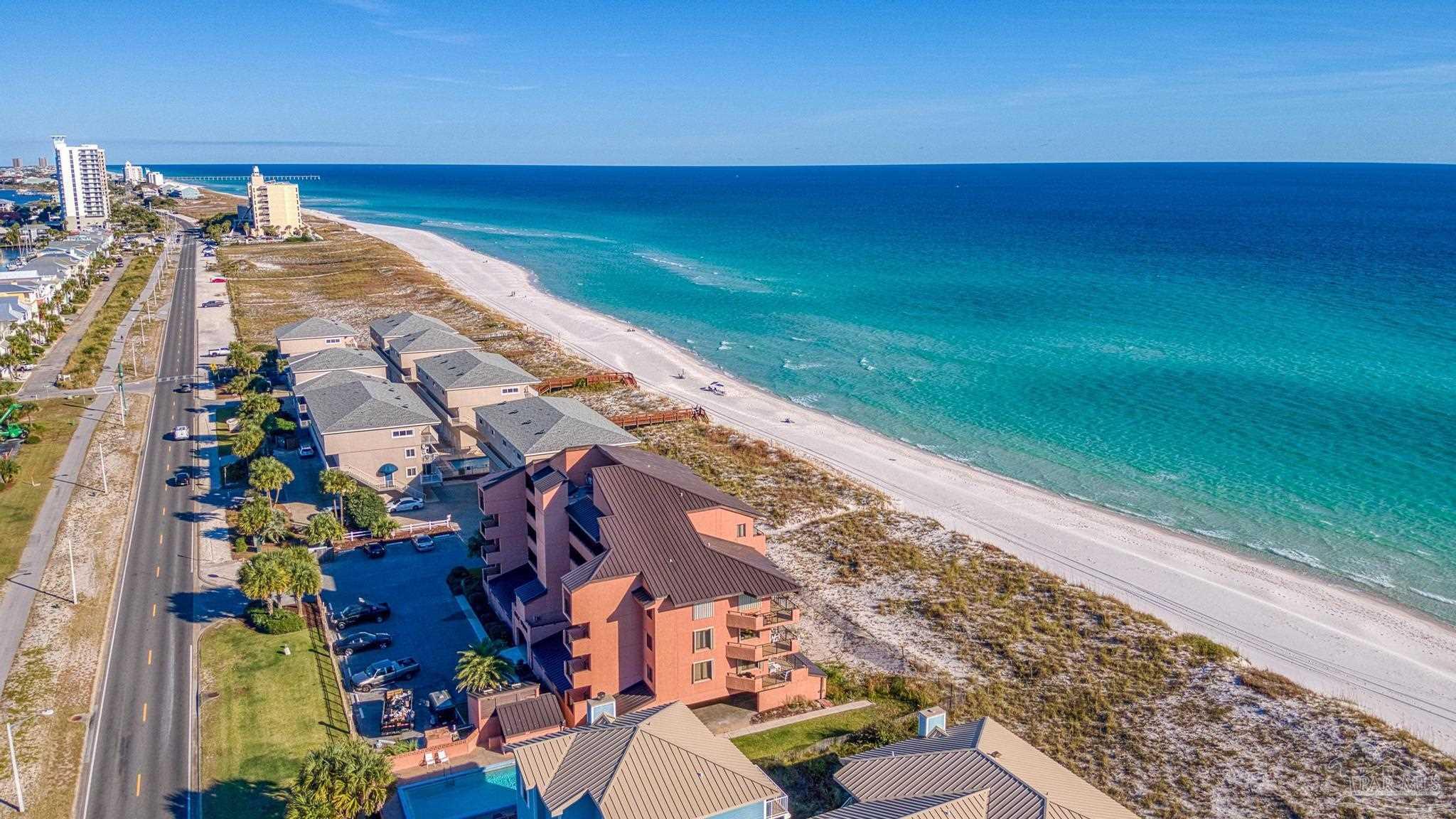 1199 Fort Pickens Road, Unit 402 Pensacola Beach, FL 32561 - Photo 11 of 12 a view of a city and an ocean view