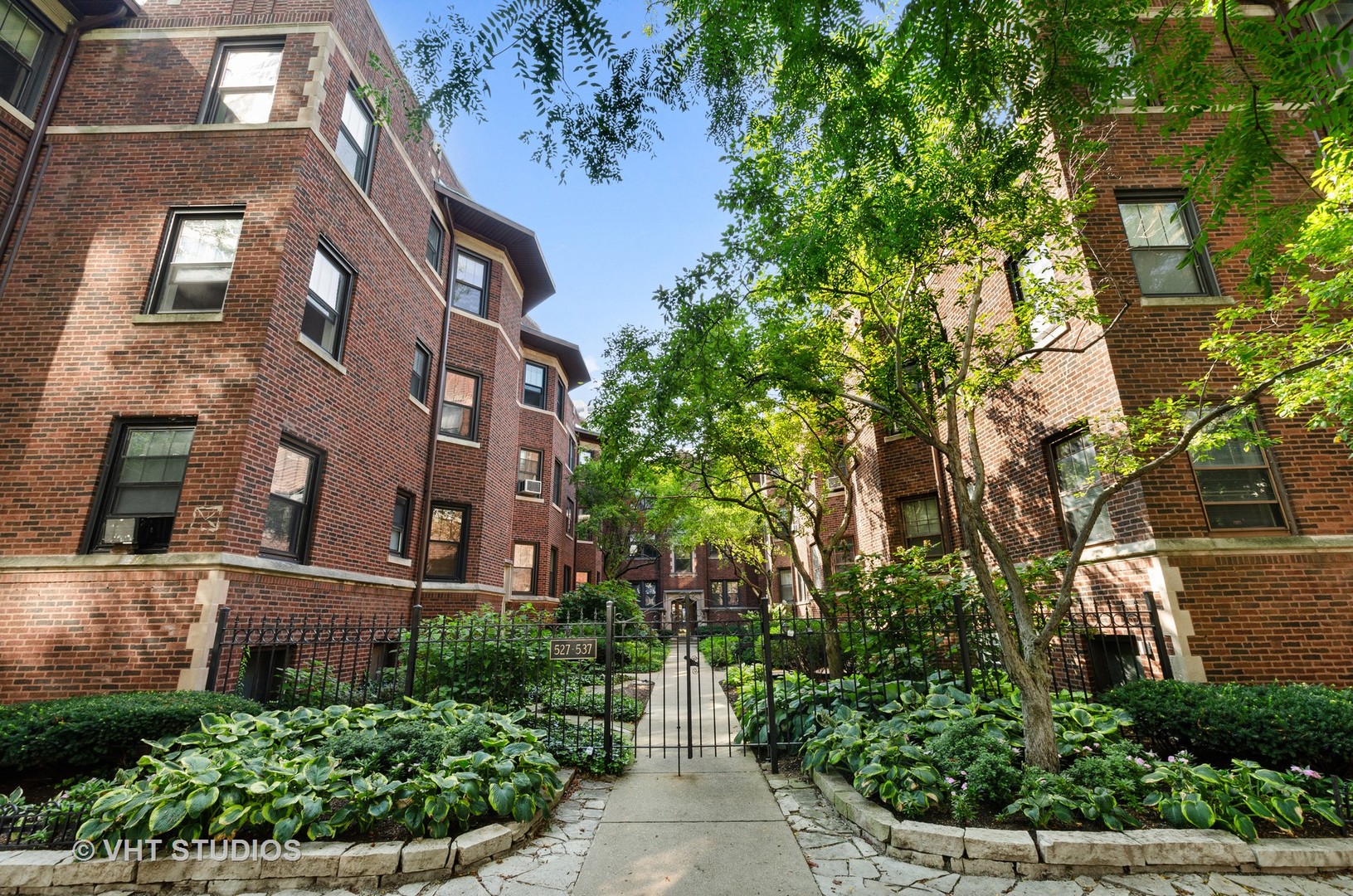 535 West Brompton Avenue, Unit 3S Chicago, IL 60657 - Photo 1 of 12 front view of a brick building