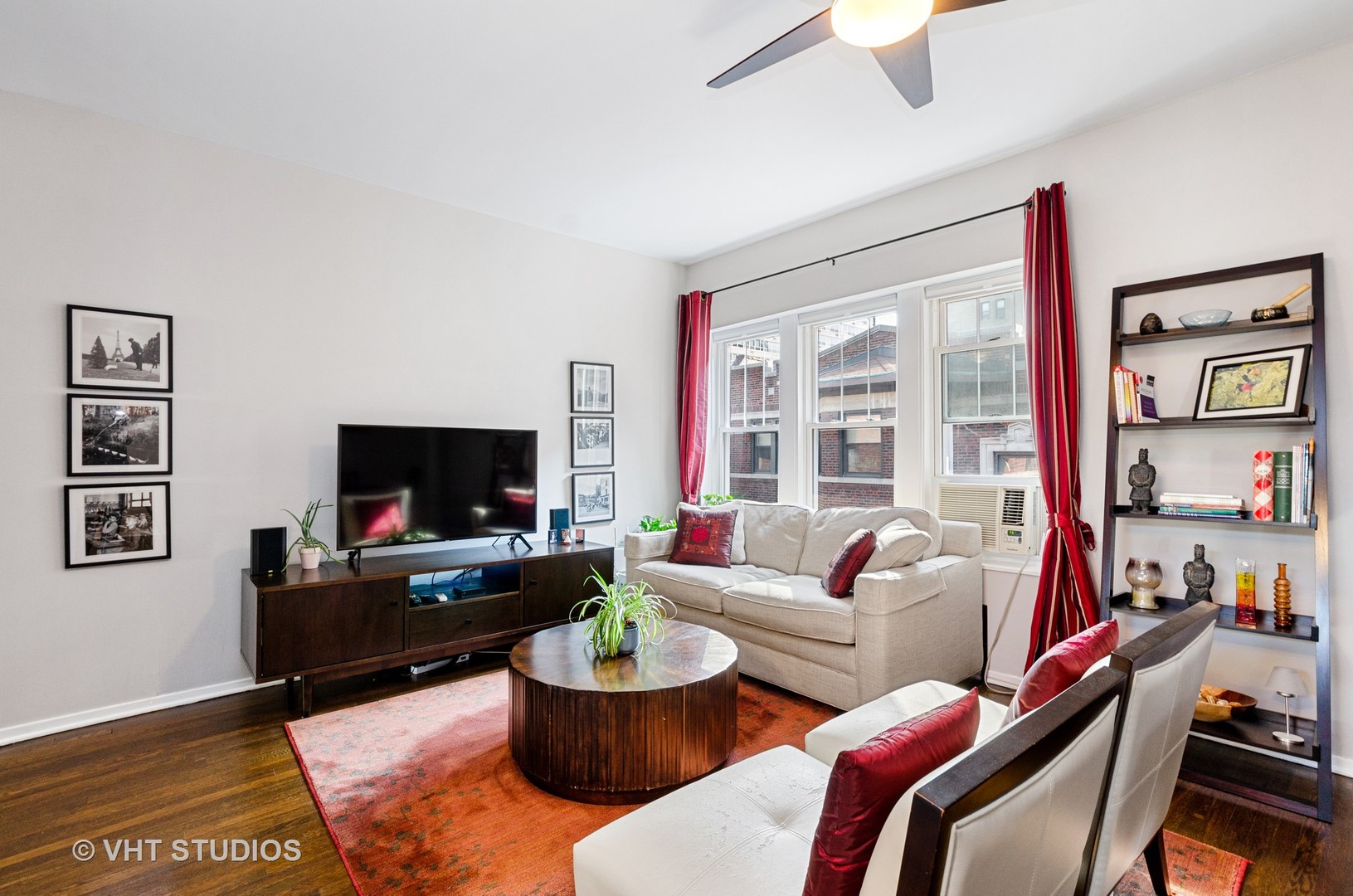 535 West Brompton Avenue, Unit 3S Chicago, IL 60657 - Photo 3 of 12 a living room with furniture and a flat screen tv