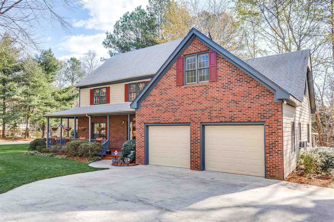8108 Mourning Dove Road Raleigh, NC 27615 - Photo 5 of 25 THIS SPACIOUS 2 CAR GARGE HAD NEW STEEL INSULATED GARAGE DOORS INSTALLED IN 2015. THE SELLER HAS A FULLY FUNCTIONING AC UNIT IN THE GARAGE THAT WILL STAY. Exterior Front