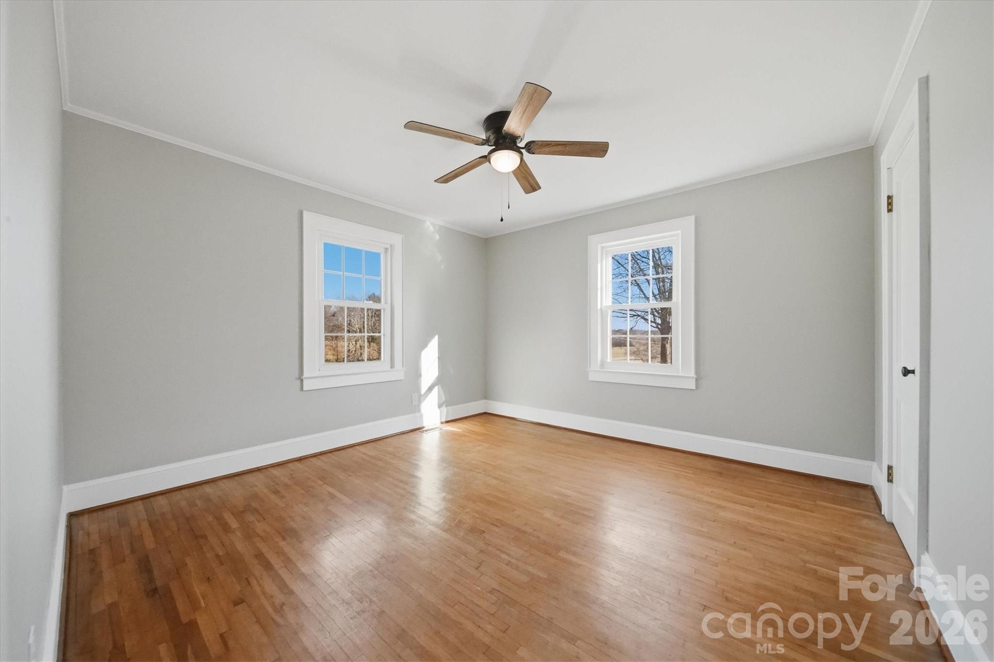 4141 Laney Road Maiden, NC 28650 - Photo 20 of 47 a view of an empty room with window and wooden floor
