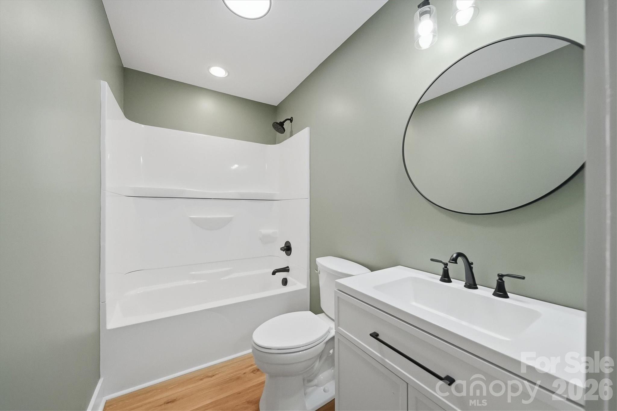 4141 Laney Road Maiden, NC 28650 - Photo 22 of 47 a bathroom with a sink and a mirror