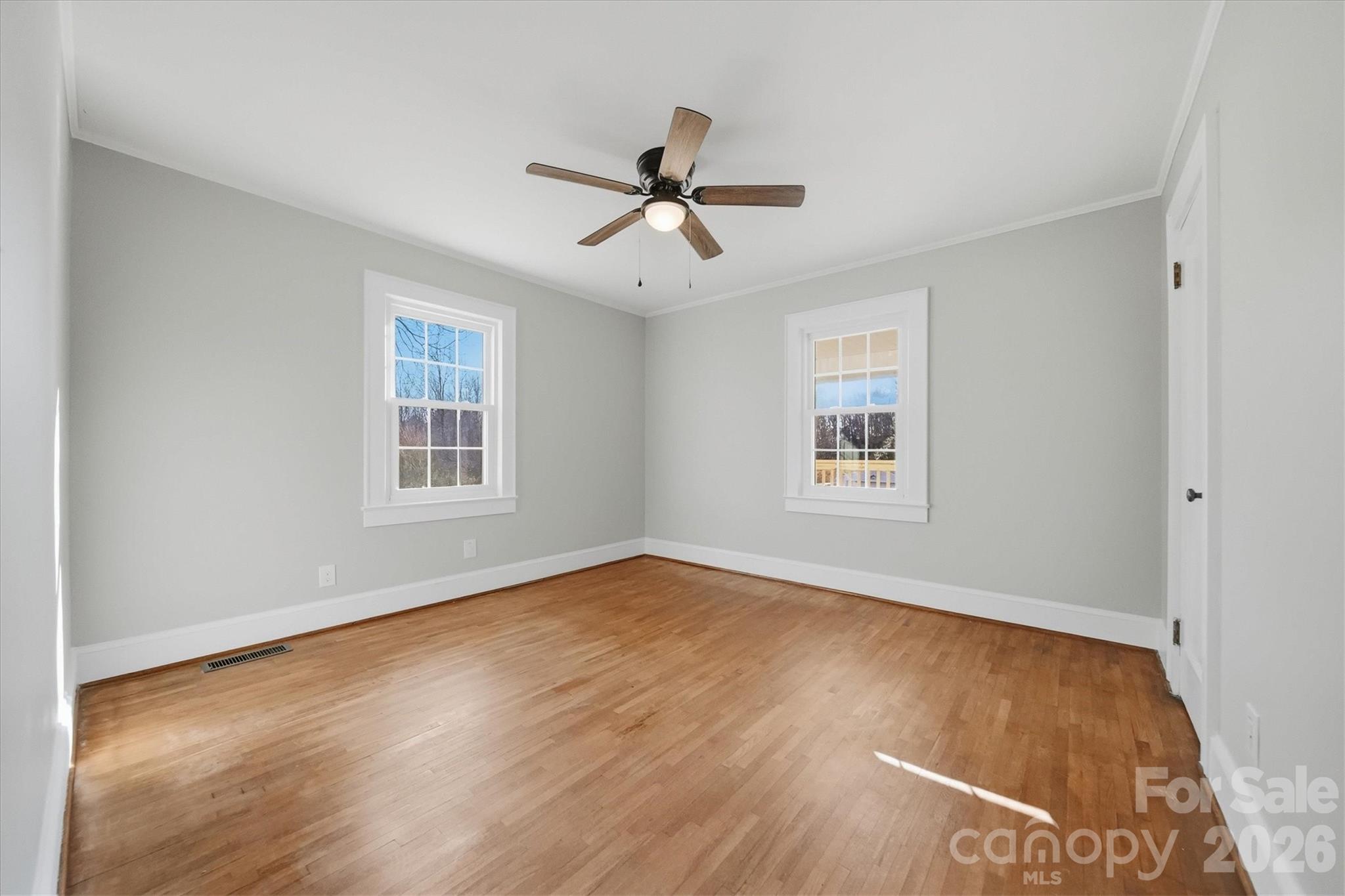 4141 Laney Road Maiden, NC 28650 - Photo 23 of 47 a view of empty room with wooden floor and fan