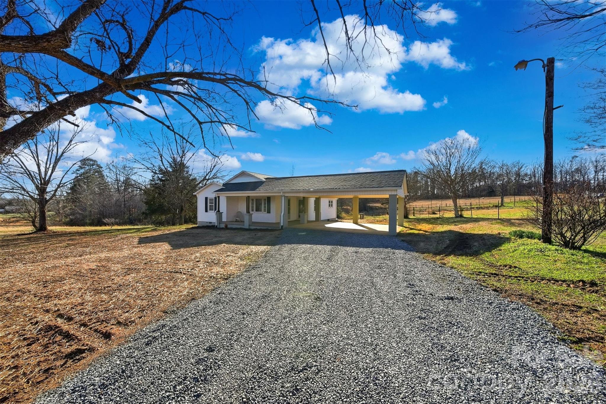 4141 Laney Road Maiden, NC 28650 - Photo 27 of 47 a view of a house with backyard and tree