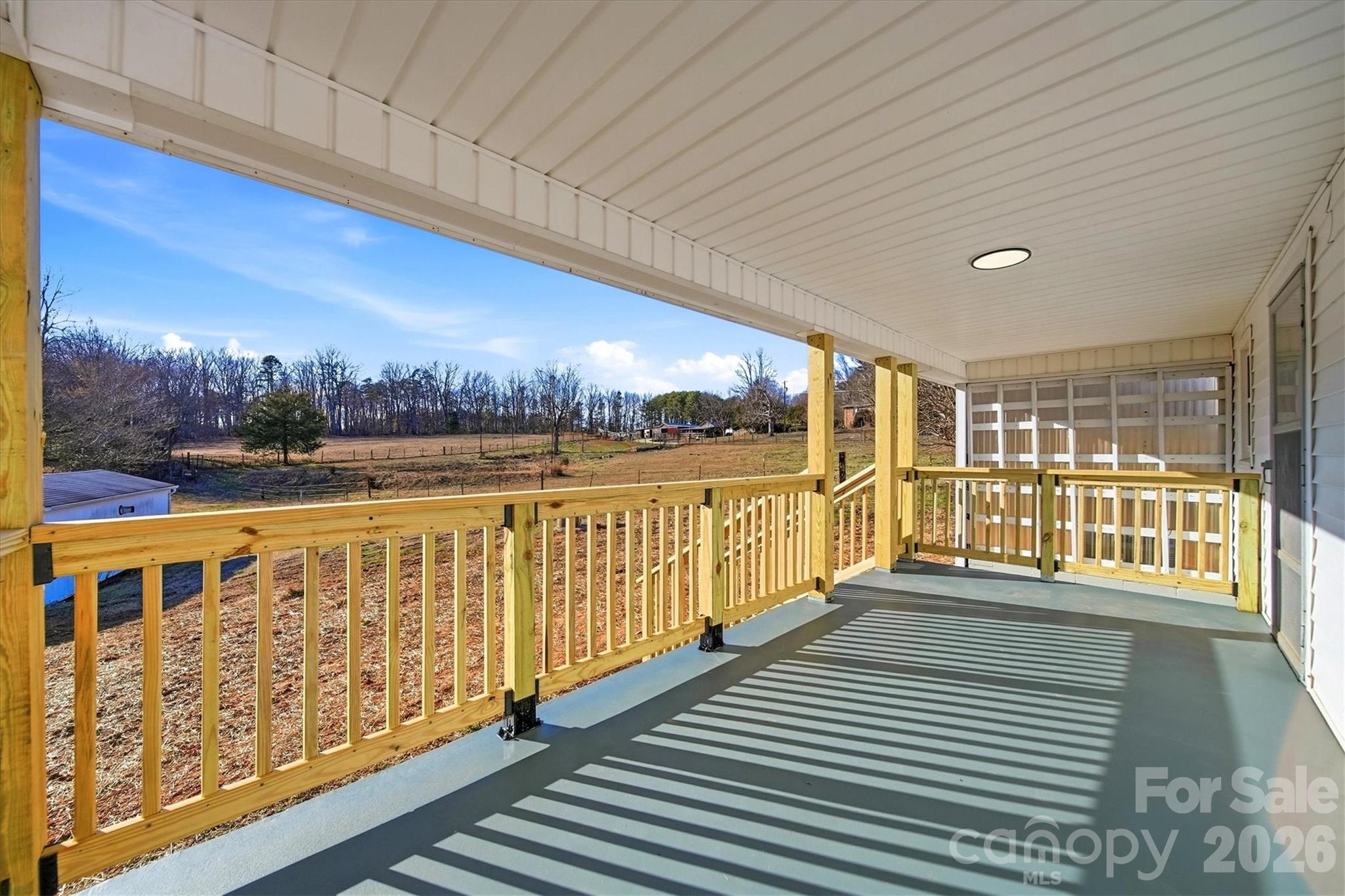 4141 Laney Road Maiden, NC 28650 - Photo 33 of 47 a view of a balcony with wooden floor