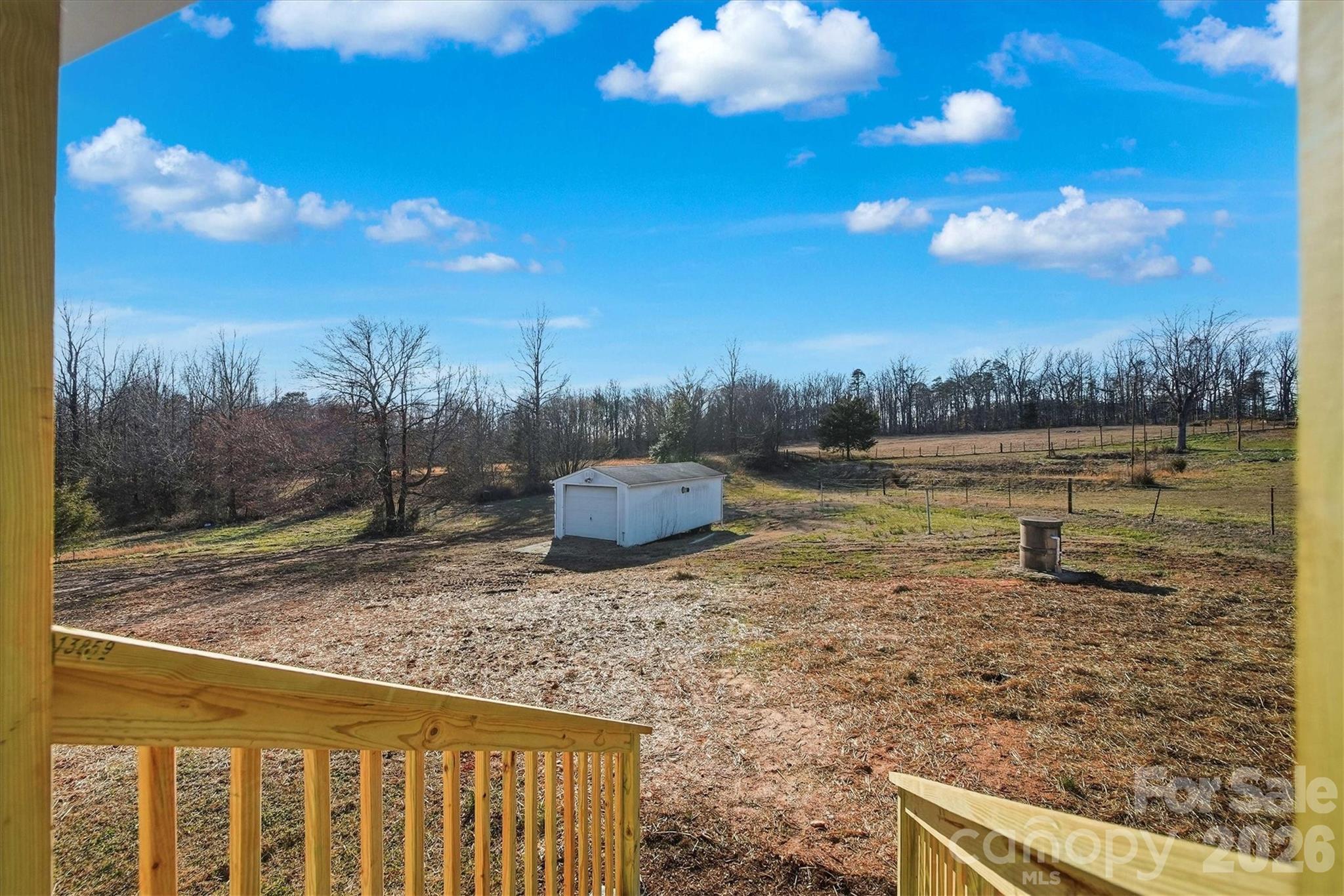 4141 Laney Road Maiden, NC 28650 - Photo 34 of 47 a view of a lake with a yard