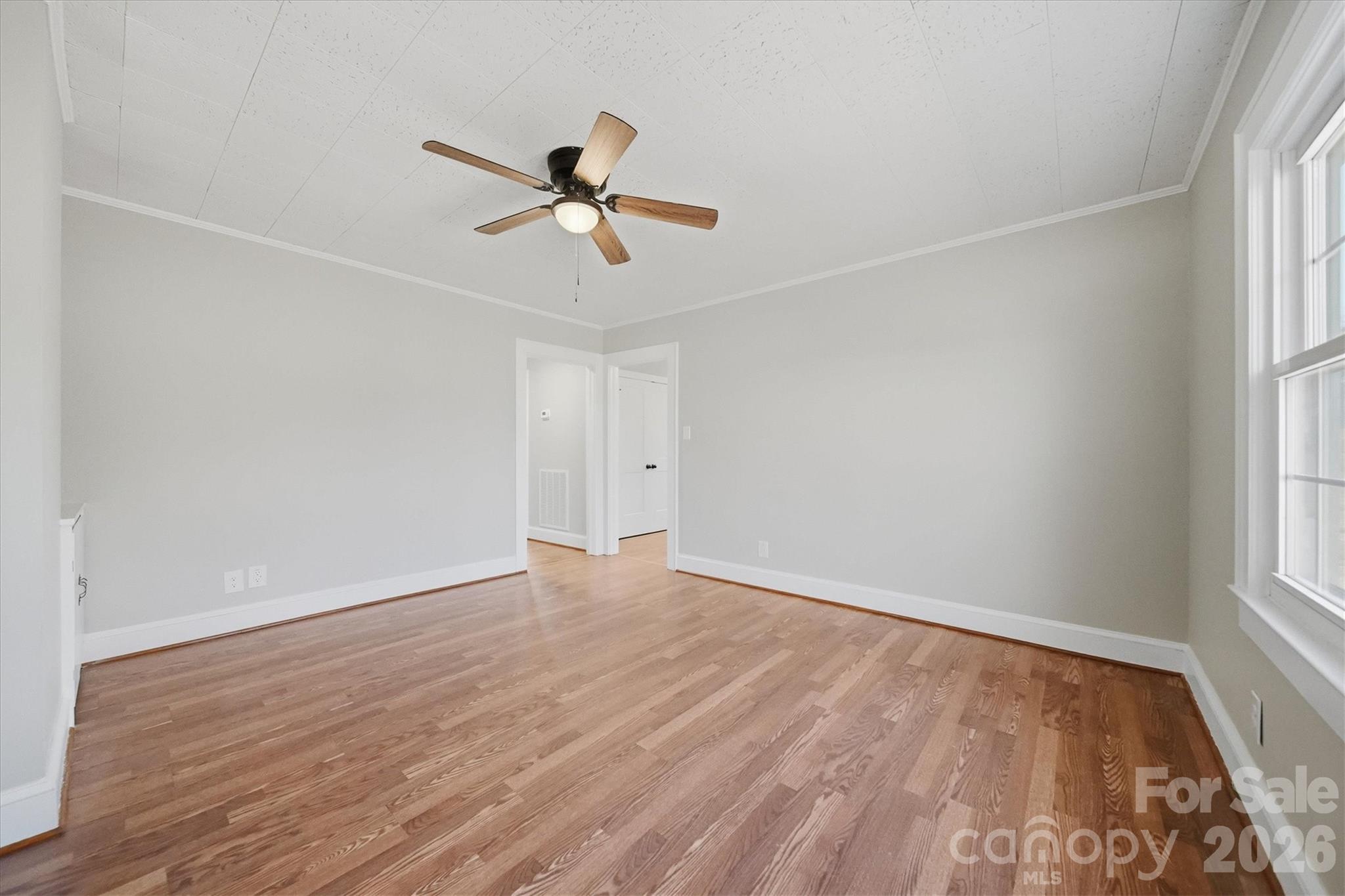 4141 Laney Road Maiden, NC 28650 - Photo 7 of 47 a view of empty room with wooden floor and fan