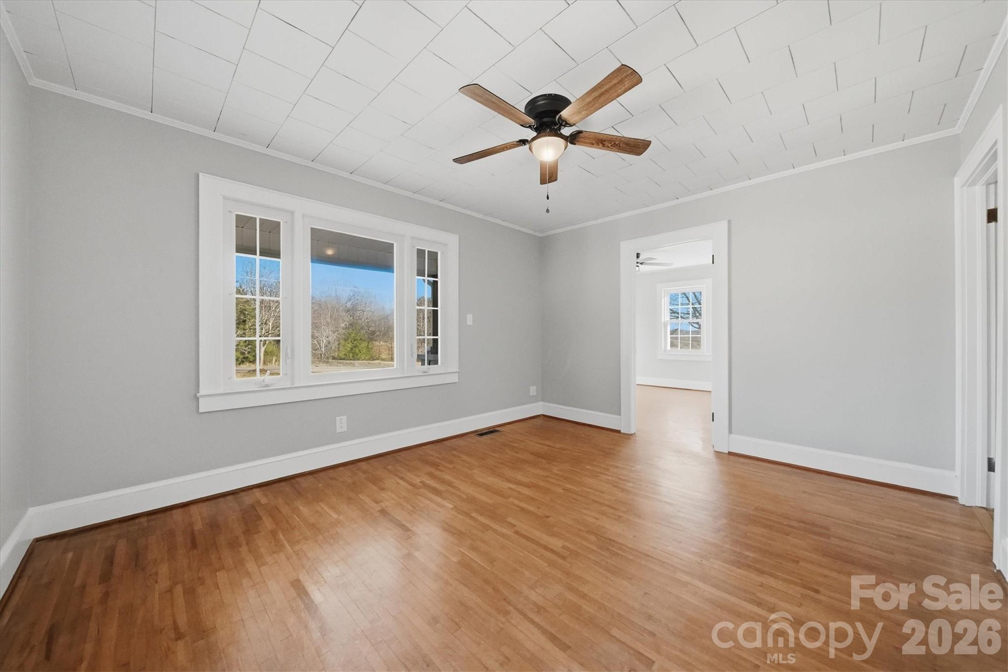 4141 Laney Road Maiden, NC 28650 - Photo 10 of 47 a view of empty room with wooden floor and fan