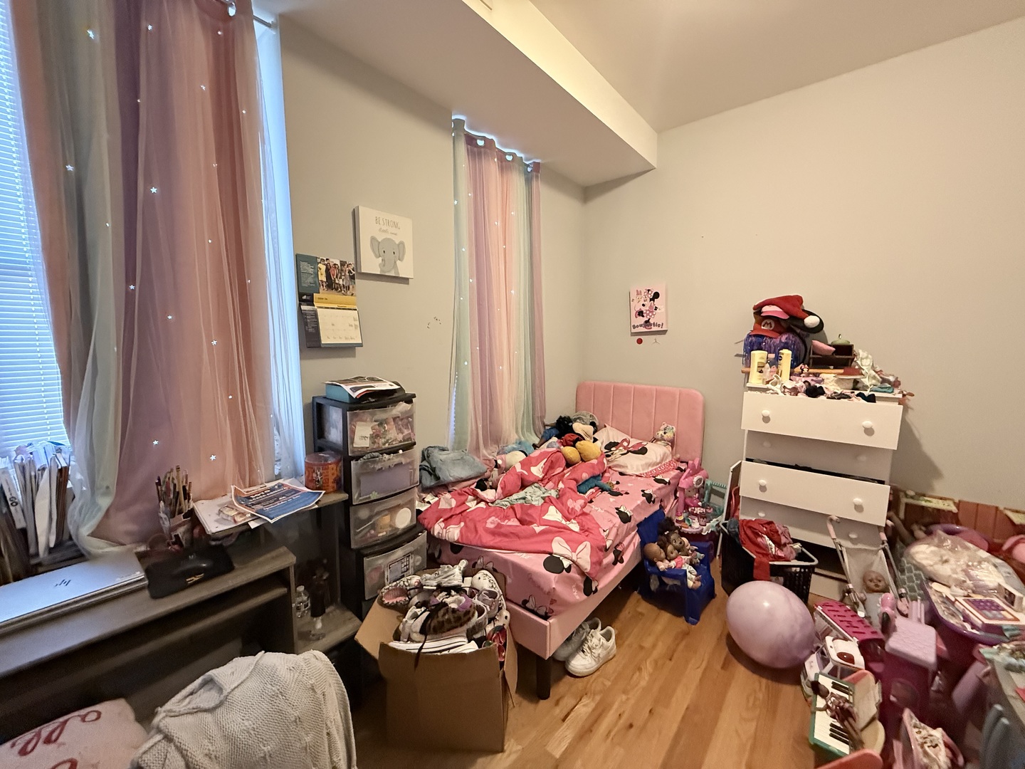2815 West 25th Street Chicago, IL 60623 - Photo 13 of 27 a bedroom with furniture and a wooden floor