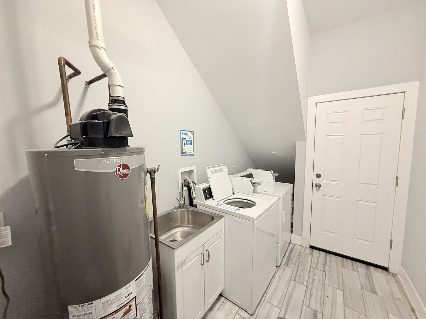 2815 West 25th Street Chicago, IL 60623 - Photo 15 of 27 a view of a storage & utility room with a sink