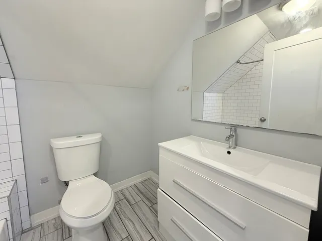 a bathroom with a sink and a toilet