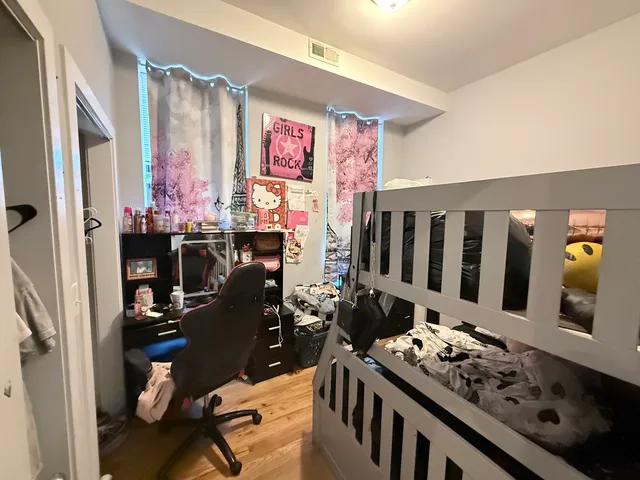 a view of living room with furniture and window