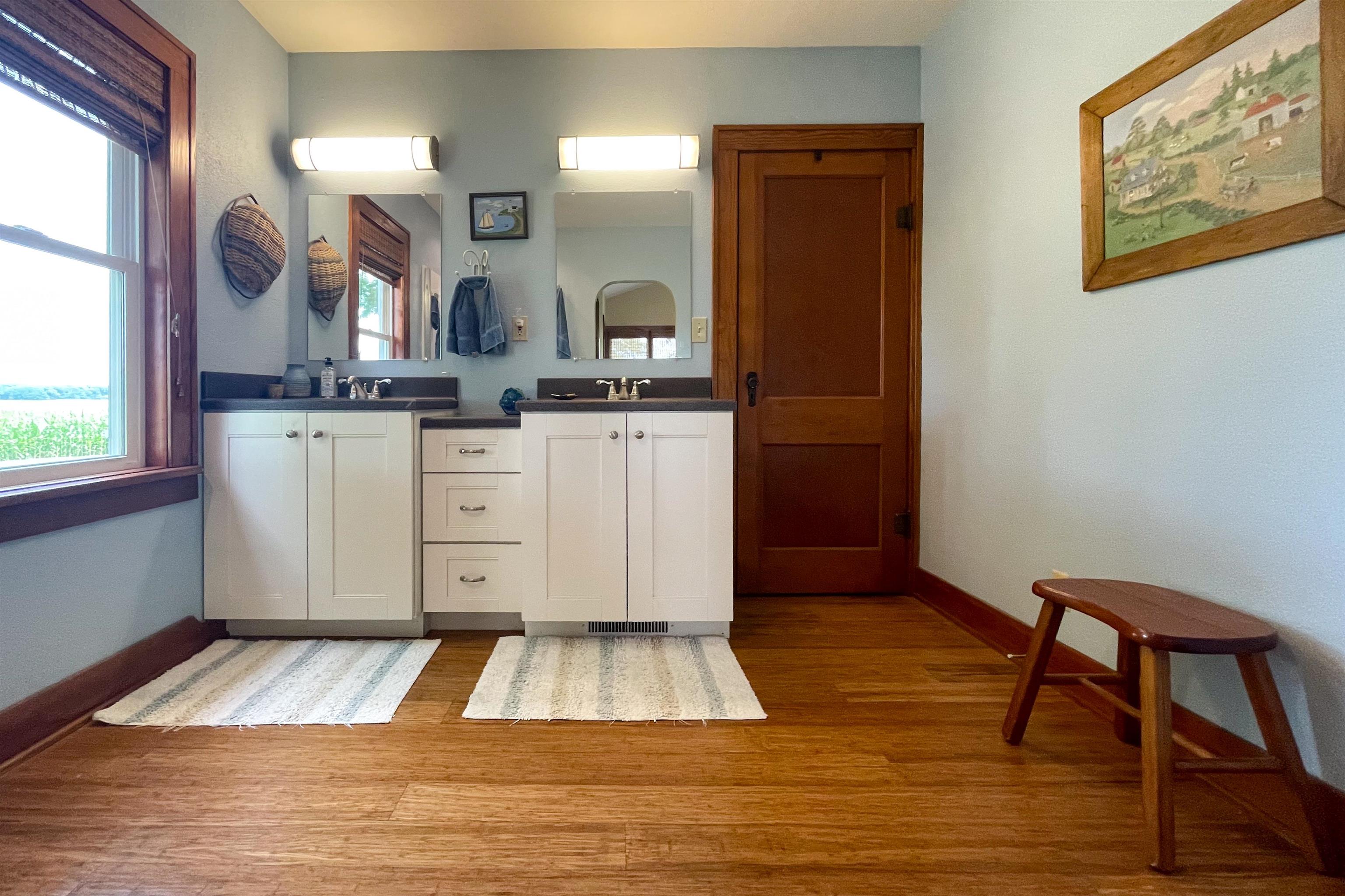 9783 North Main Road Rockton, IL 61072 - Photo 19 of 31 a room with wooden floors and glass door