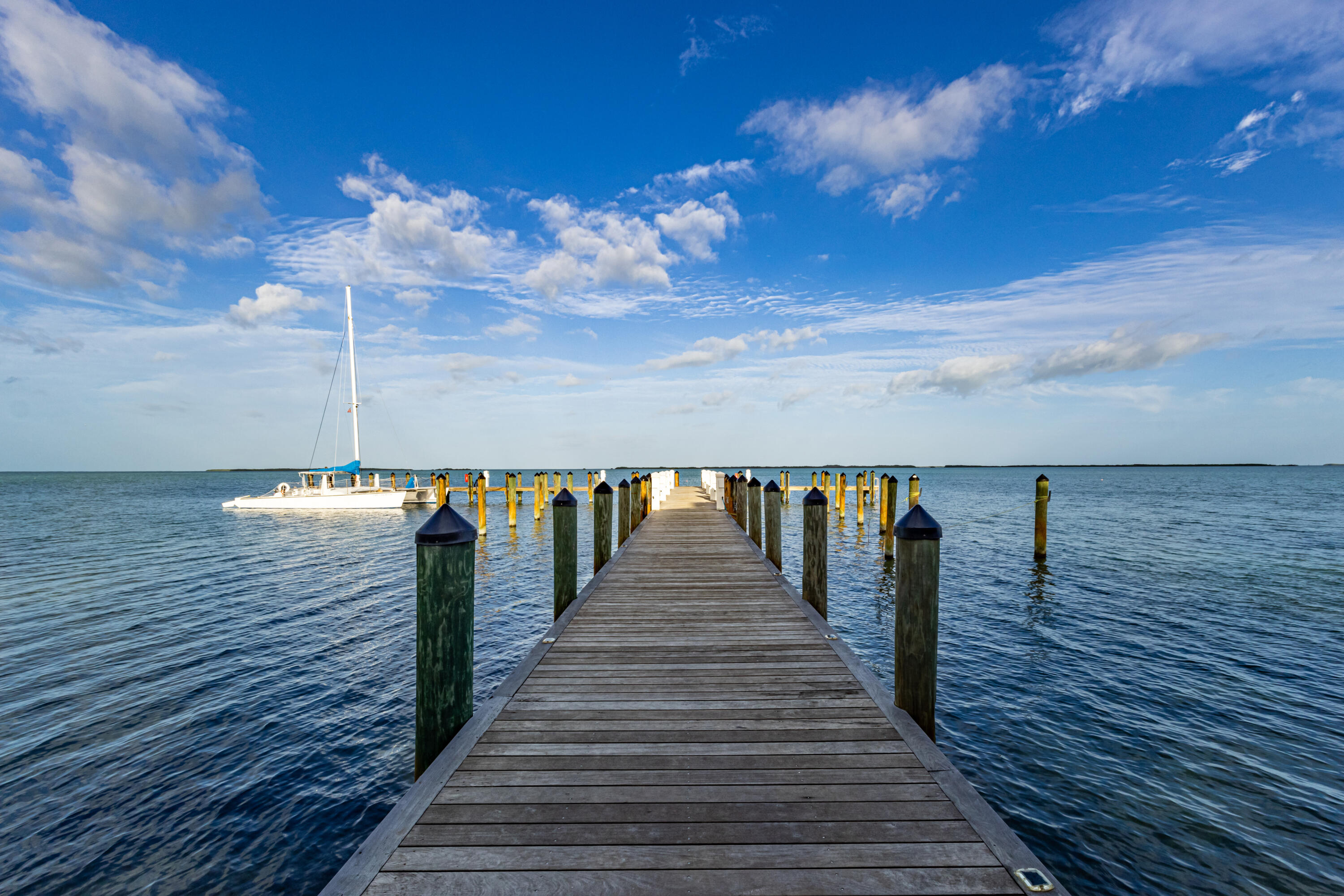 46 East Playa Largo Boulevard Key Largo, FL 33037 - Photo 20 of 48 a view of a balcony with wooden floor