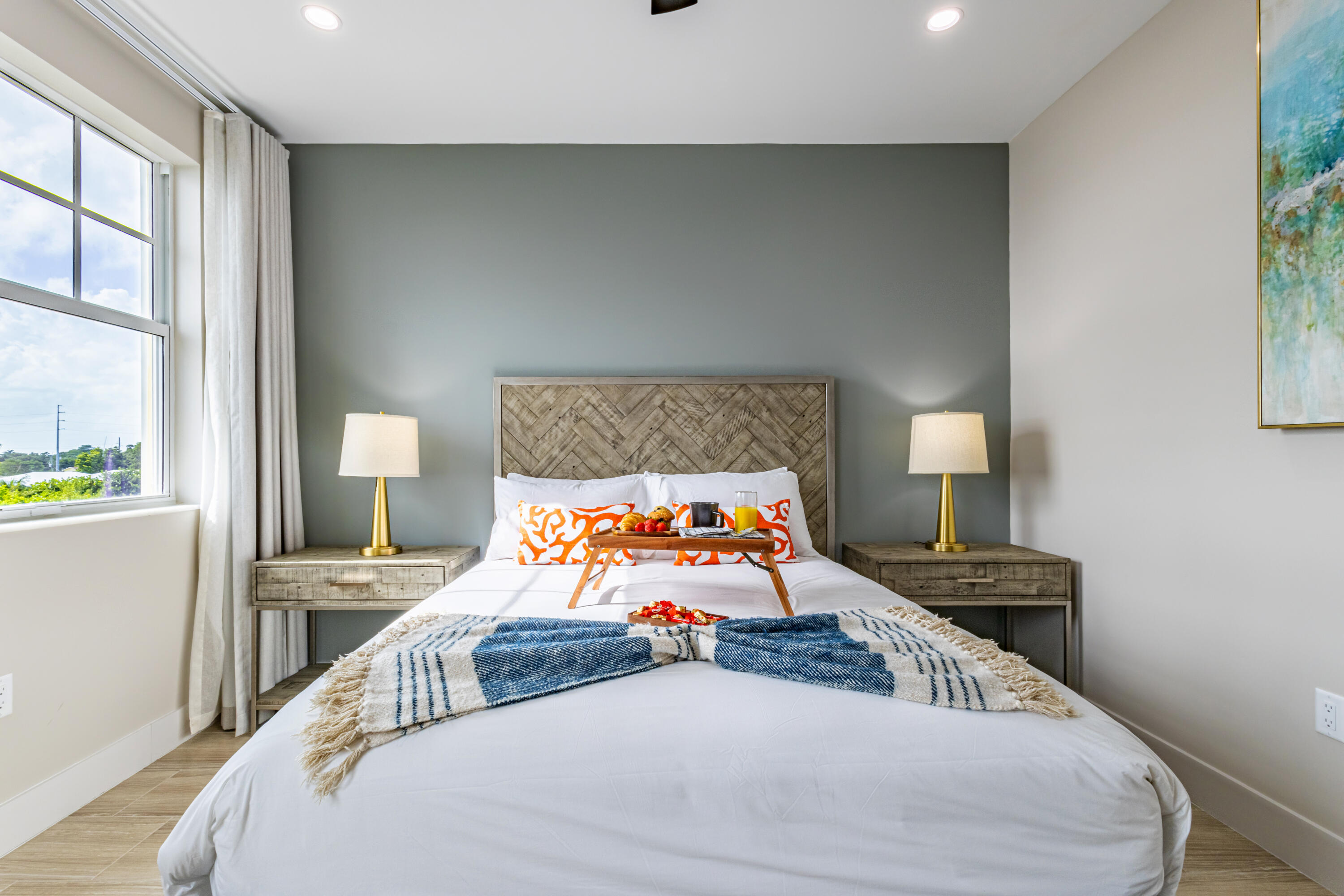 46 East Playa Largo Boulevard Key Largo, FL 33037 - Photo 3 of 48 a bedroom with a bed and wooden floor