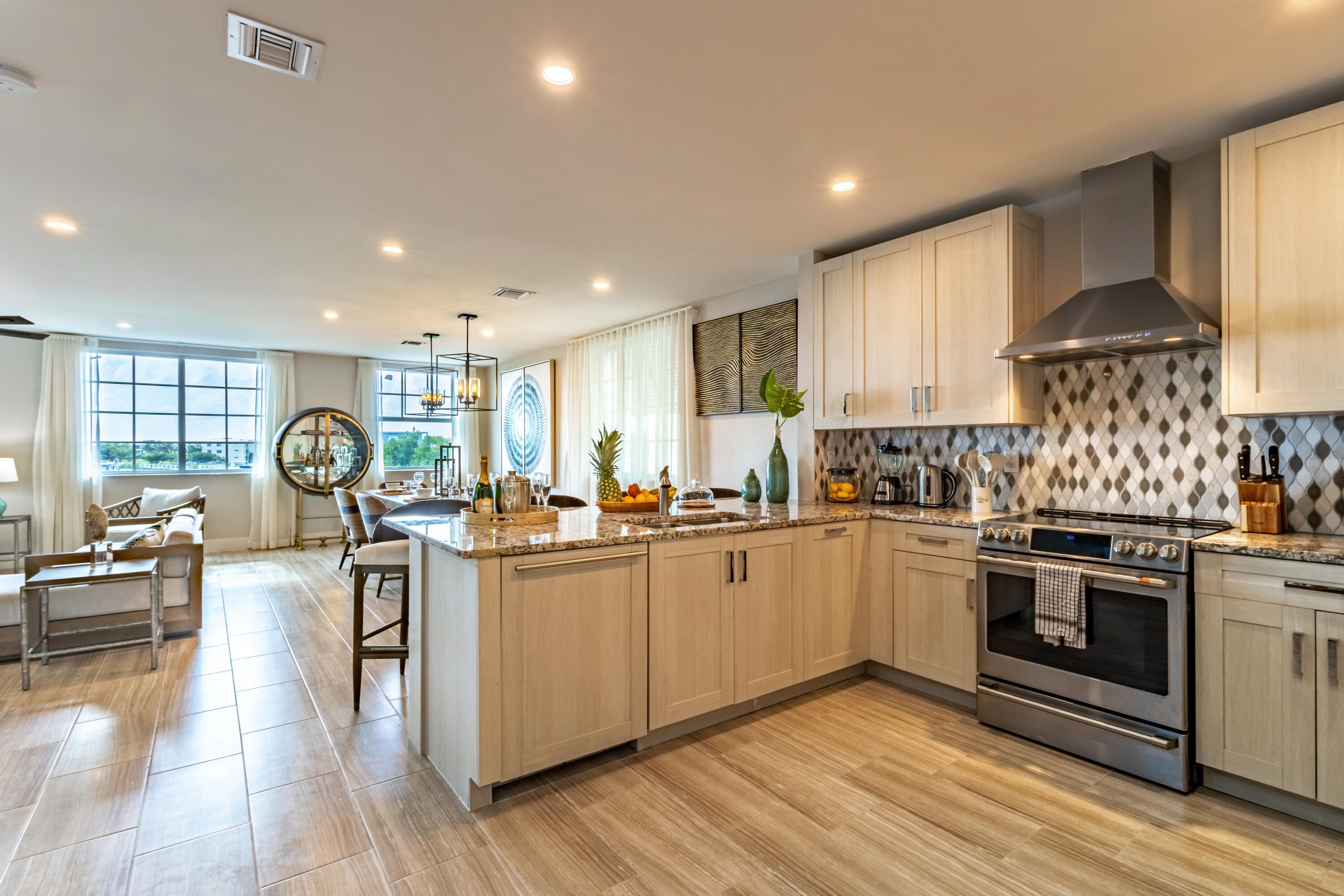 46 East Playa Largo Boulevard Key Largo, FL 33037 - Photo 35 of 48 a kitchen with stainless steel appliances granite countertop a stove and a sink