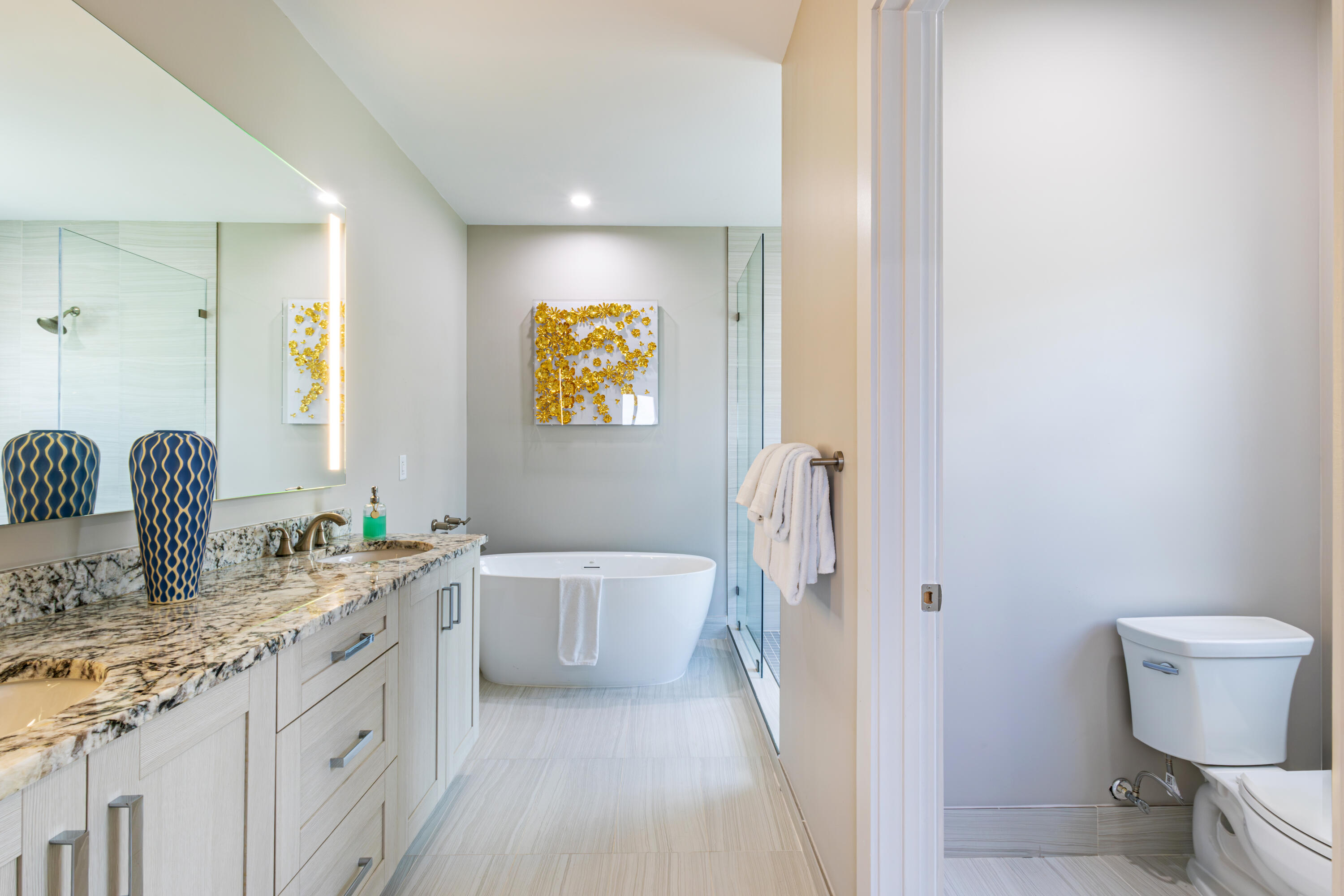 46 East Playa Largo Boulevard Key Largo, FL 33037 - Photo 38 of 48 a bathroom with a granite countertop sink and a mirror