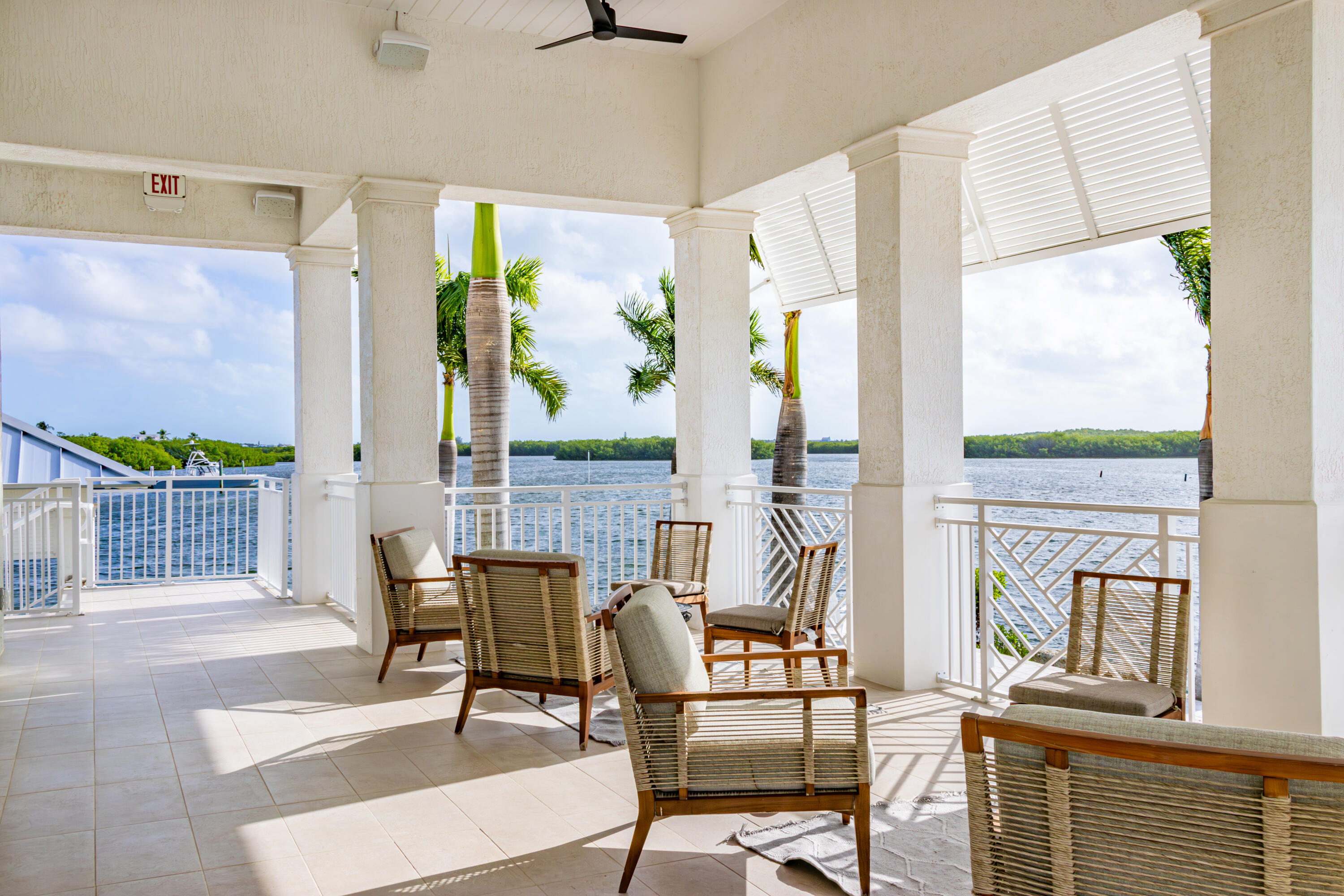 46 East Playa Largo Boulevard Key Largo, FL 33037 - Photo 8 of 48 a living room with furniture and a large window