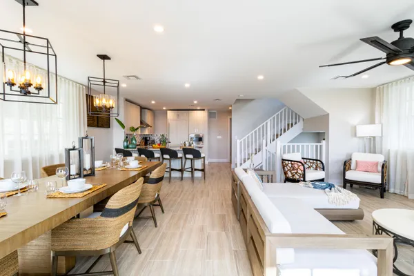 a bedroom with a bed and a lamp