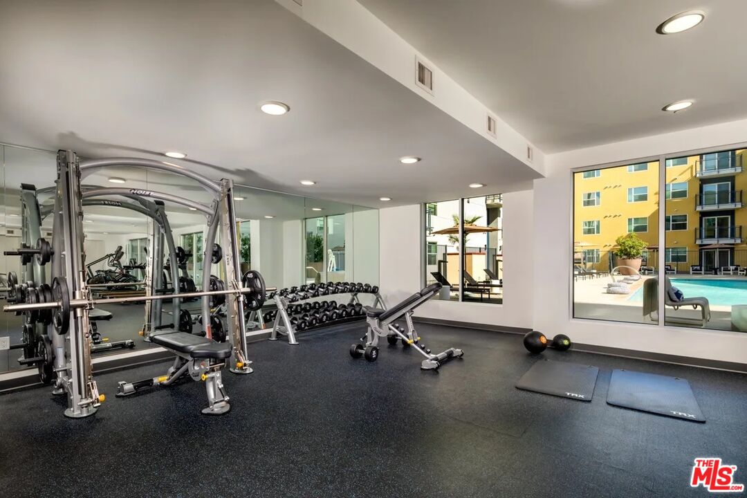 10568 Promenade Gateway, Unit 451 El Monte, CA 91731 - Photo 27 of 32 a view of a room with gym equipment