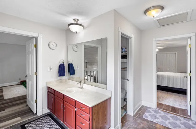 a bathroom with a sink and a mirror