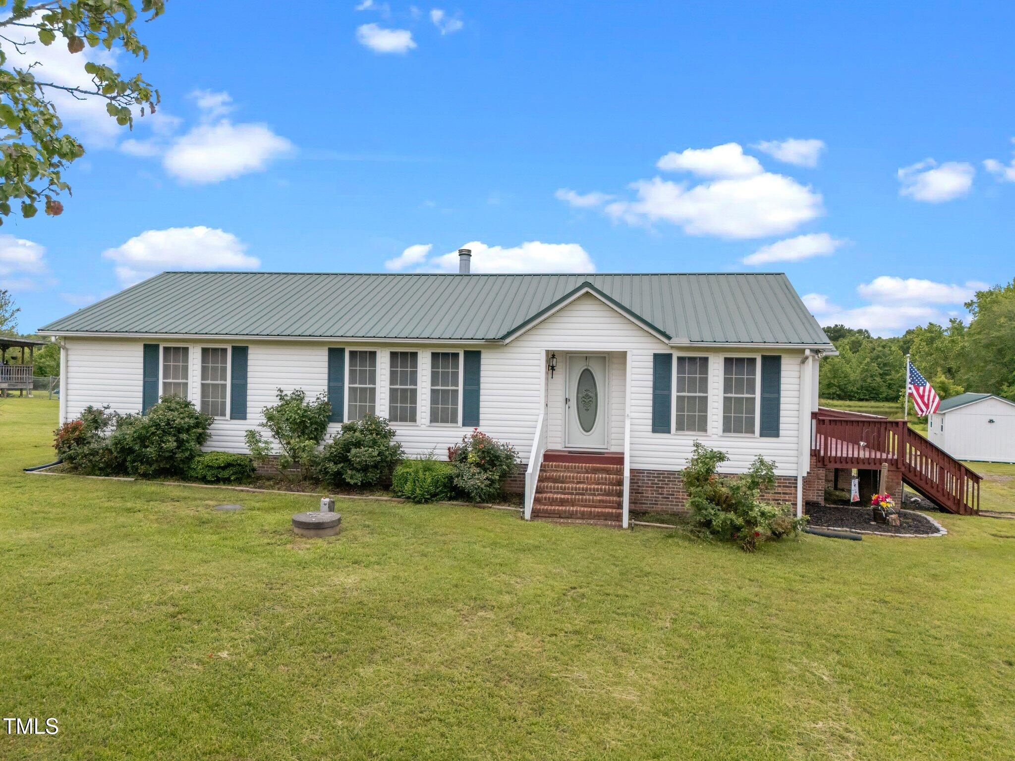 1993 Lucy Garrett Road Roxboro, NC 27574 - Photo 2 of 49 2-web-or-mls-DJI_20250521122040_0019_D