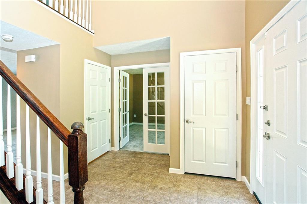9780 Grosick Road Pittsburgh, PA 15237 - Photo 2 of 22 Enter into this spacious 2-story foyer. Home is in impeccable condition. Neutral ceramic tile flooring in Entry, hallway and Kitchen. Den with French doors.