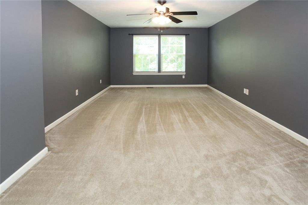 9780 Grosick Road Pittsburgh, PA 15237 - Photo 12 of 22 Large Master Bedroom with freshly steamed floors. Includes Fan and Light combo.