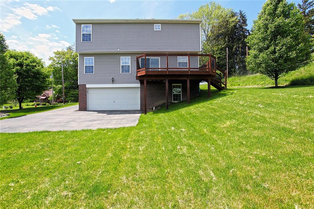 9780 Grosick Road Pittsburgh, PA 15237 - Photo 21 of 22 Back yard view of house. Nice space between you and your neighbors.