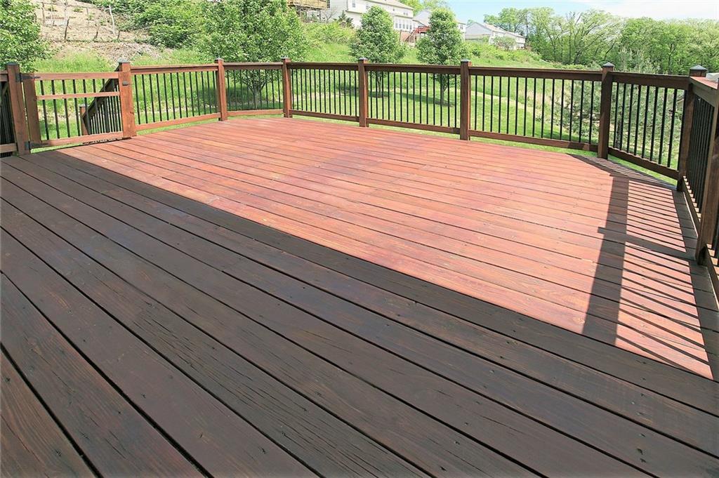 9780 Grosick Road Pittsburgh, PA 15237 - Photo 8 of 22 Large expansive deck waiting for you. Gate with stairs leads down to the back level yard for easy access.