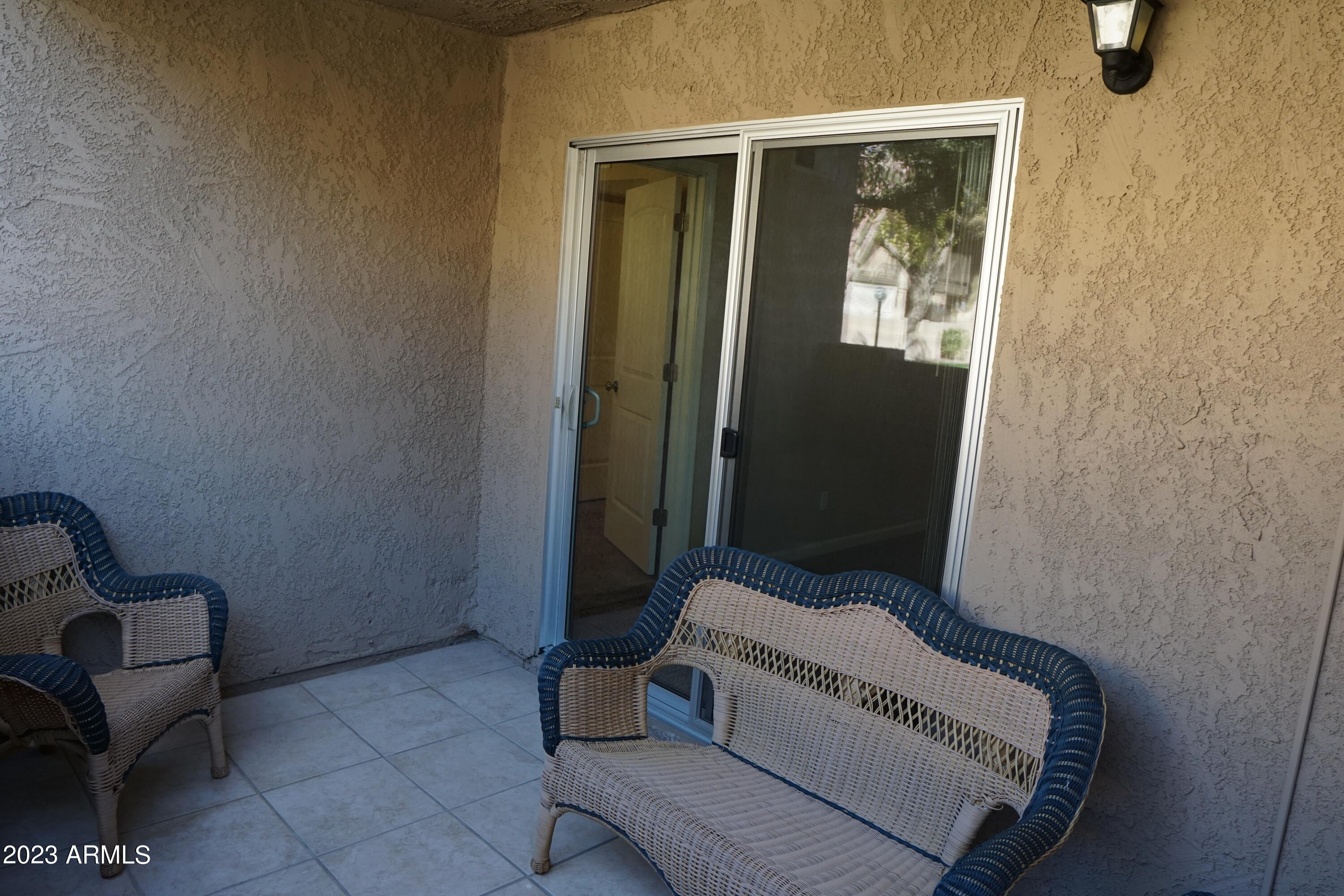 5525 East Thomas Road, Unit K1 Phoenix, AZ 85018 - Photo 12 of 46 Outside enclose patio looking in