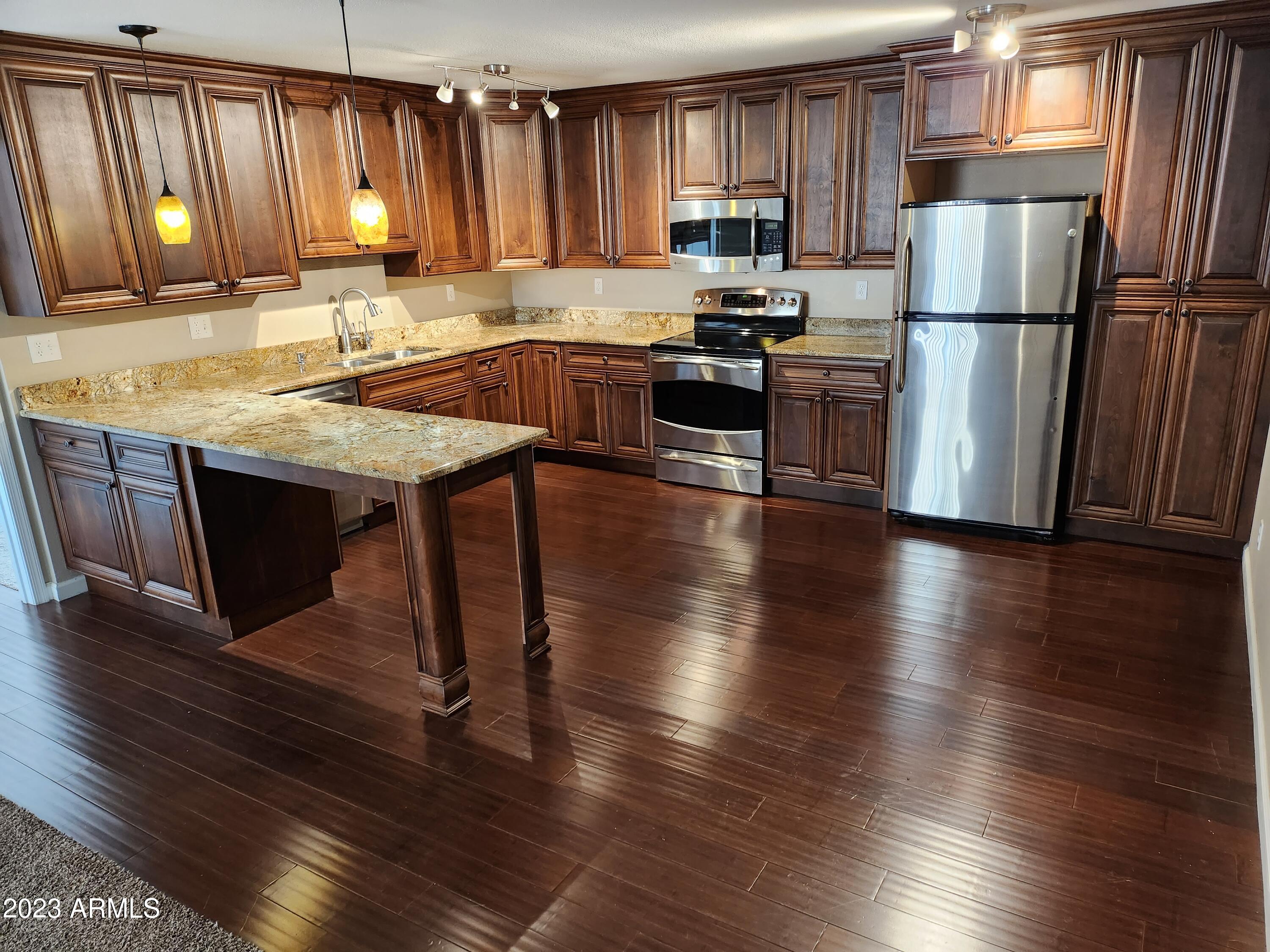 5525 East Thomas Road, Unit K1 Phoenix, AZ 85018 - Photo 3 of 46 Updated Kitchen Cabinets Stainless Grani