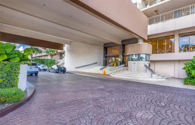 a view of swimming pool from a balcony