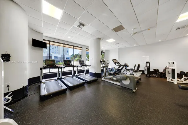 a gym area with gym equipment