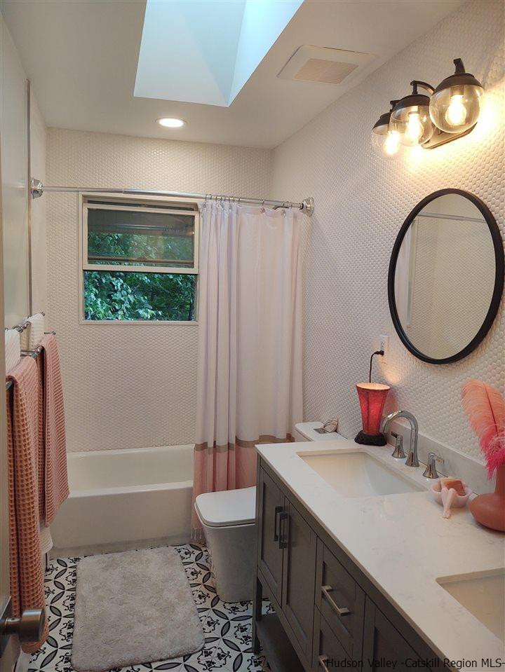 2 Mountain Valley Road Boiceville, NY 12412 - Photo 19 of 35 a bathroom with a toilet sink and mirror